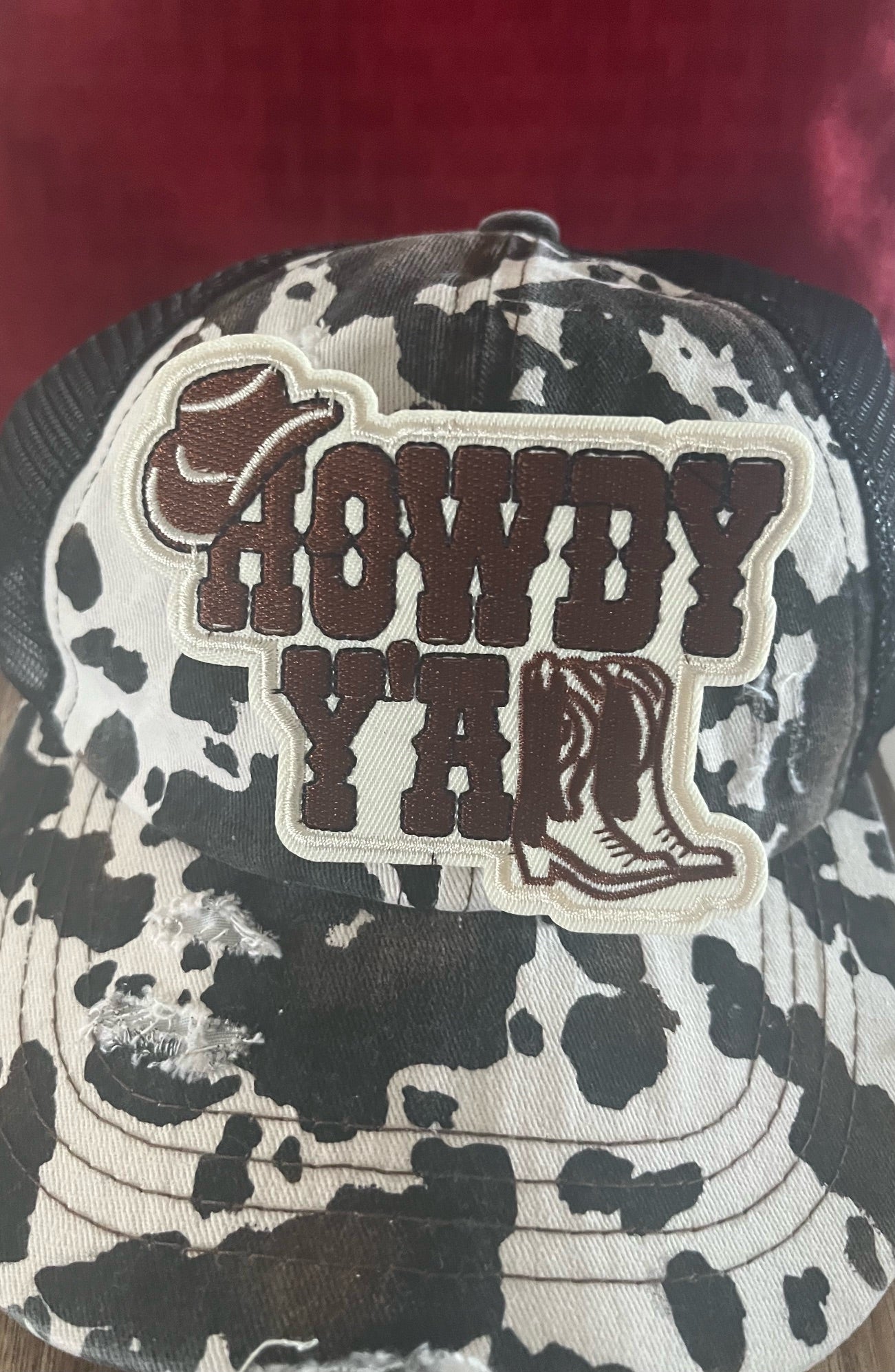HOWDY YALL COW PRINT -TRUCKER HAT WITH PONYTAIL BACK
