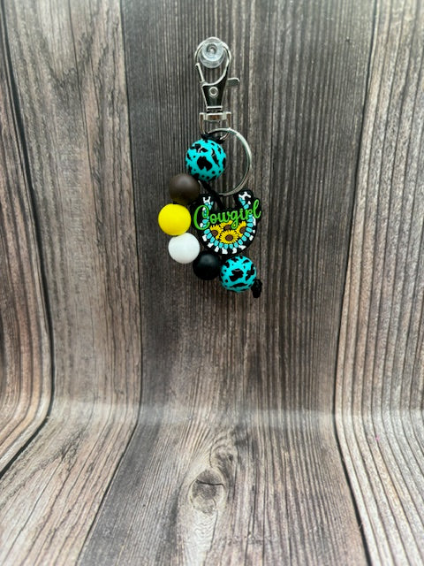 COWGIRL HALF MOON KEYCHAIN